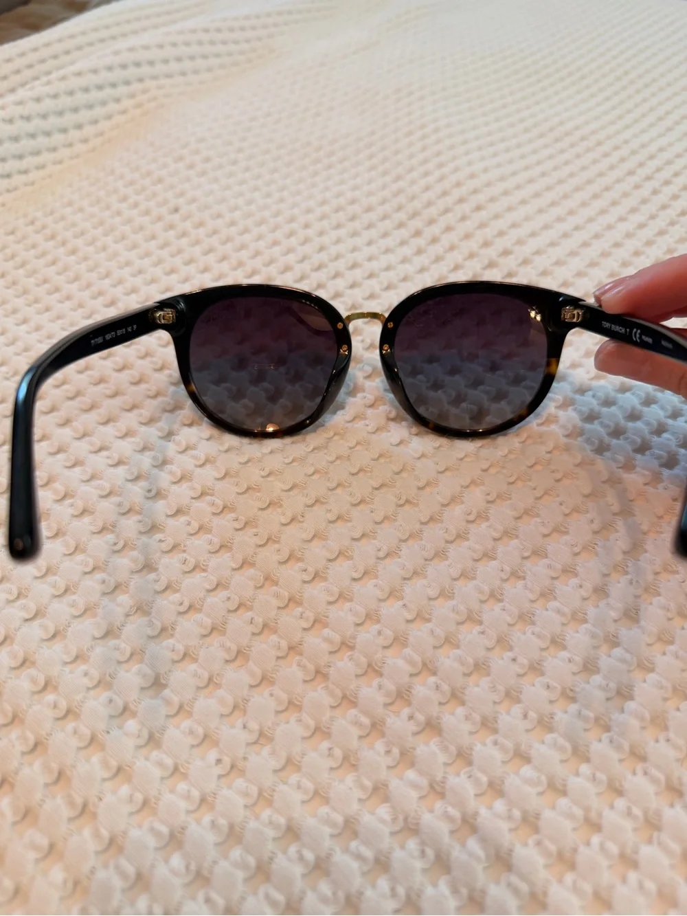 Tory Burch ideal touch included